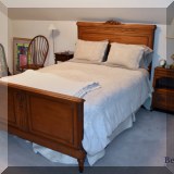 F45. Full size antique carved bed. 56&rdquo;h 